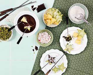 Chokladfondue med frukt och strössel